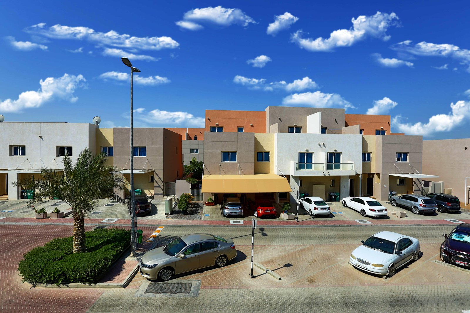 Aerial view of Al Reef Villas community with themed clusters – alreefvillas.ae